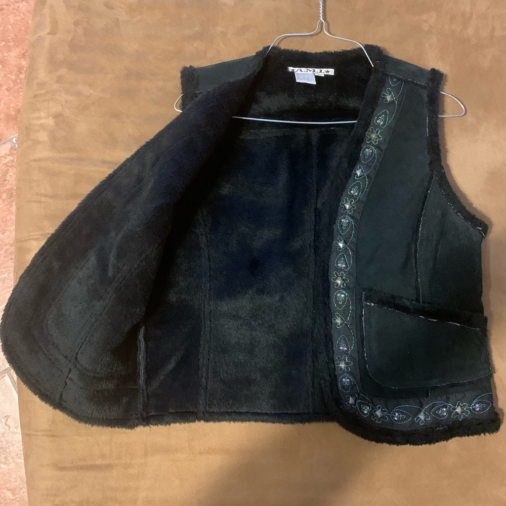 A M I medium size dark blue vest